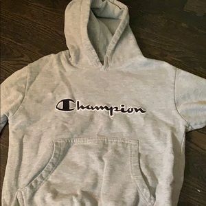 Grey athletic Champion hoodie.